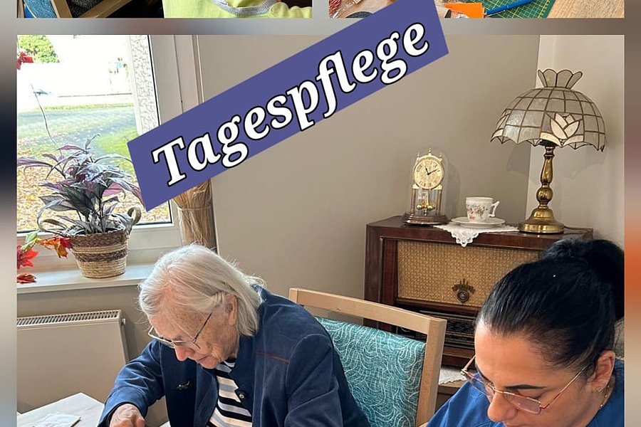 Aktivitäten in der Tagespflege: Senioren und Betreuer bei kreativen Bastelarbeiten am Tisch.